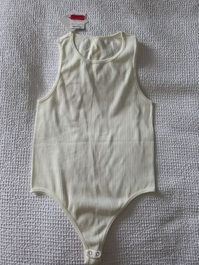 Ribbed Cream One-Piece Bodysuit